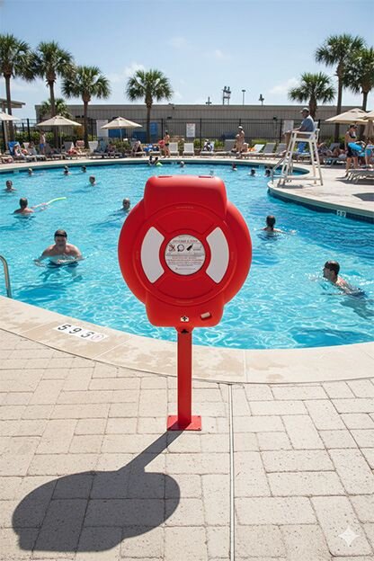 Guardian lifebuoy housing installed beside a public pool for emergency rescue