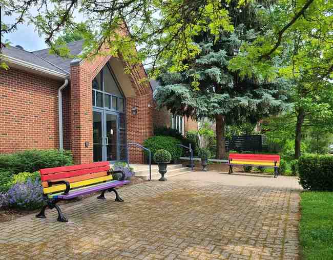 Pride bench outside Armour Heights Presbyterian Church