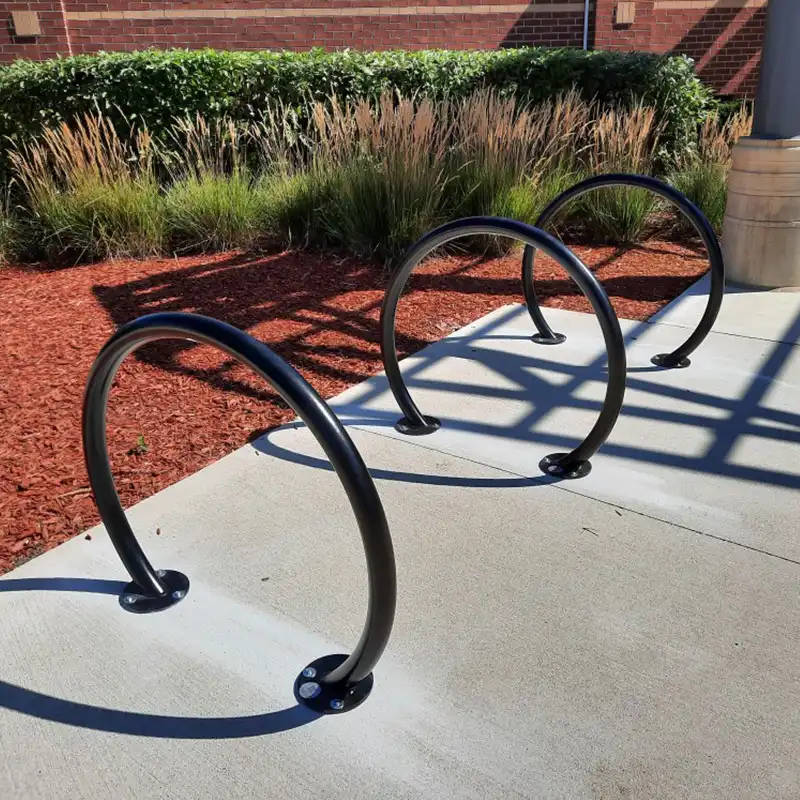 Large commercial self-watering planter with lush greenery used for low-maintenance landscaping in public and commercial spaces.