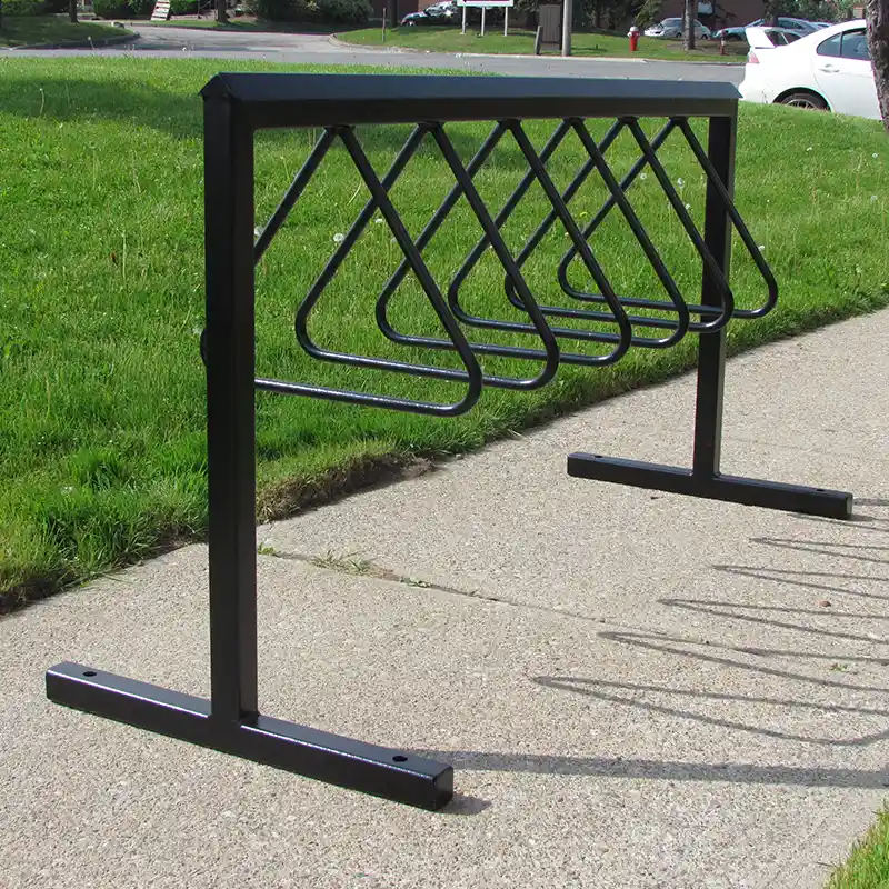 Large commercial self-watering planter with lush greenery used for low-maintenance landscaping in public and commercial spaces.