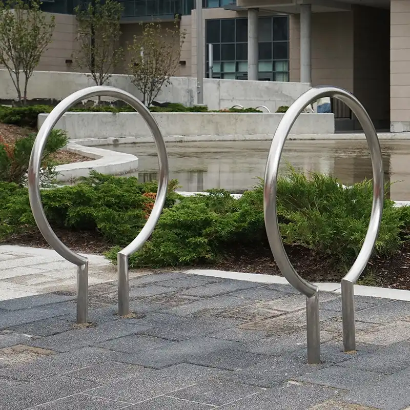 Large commercial self-watering planter with lush greenery used for low-maintenance landscaping in public and commercial spaces.